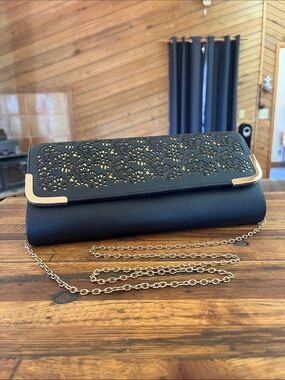 Black Laser-Cut Clutch Wristlet with Gold Chain